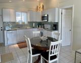 Kitchen and dining area view 1