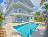 Back Exterior with Pool and Patio view 1